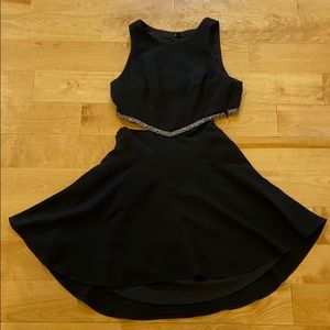 Black cutout dress with gold detailing